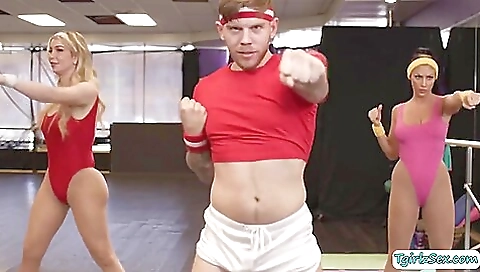 Blonde yoga babe in a bra and leggings in the studio