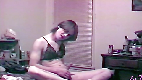 Sexy brunette with stockings gives a solo show of lingerie