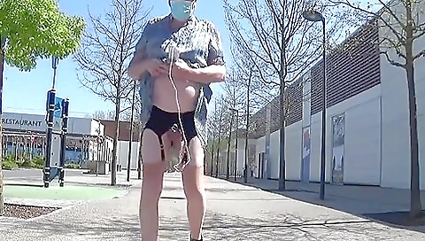 Sexy blonde in sexy lingerie shows herself outdoors